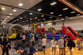 inflatables with students waiting in line